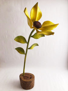 Sunflower flower carved in wood