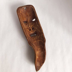 Old man carved mask